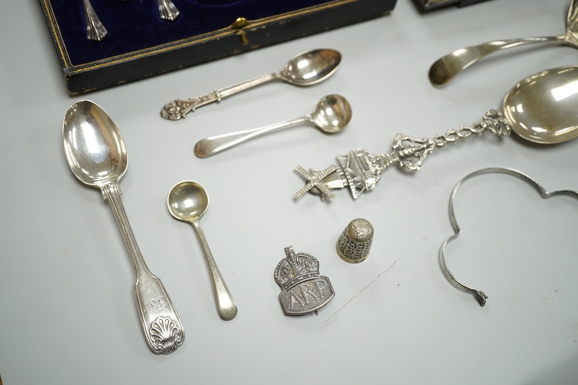 Sundry small silver including a George V mounted photograph frame, James Deakin & Sons, Sheffield, 1918, 14.8cm, a mounted cigarette box, a teaspoon, two vesta cases and thimble, together with assorted plated ware.